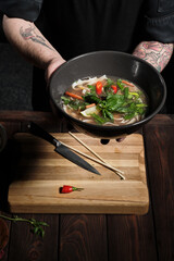 Chef offering freshly made dish