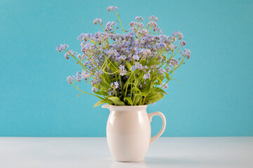 Forget me not on a blue background