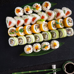 tasty sushi on the black background