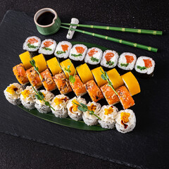 tasty sushi on the black background