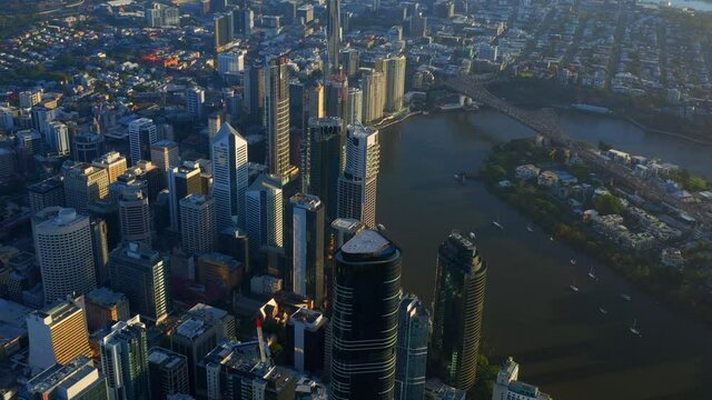 View from High above of Brisbane City CBD, Riverside and Story Bridge at Sunrise, QLD, Australia