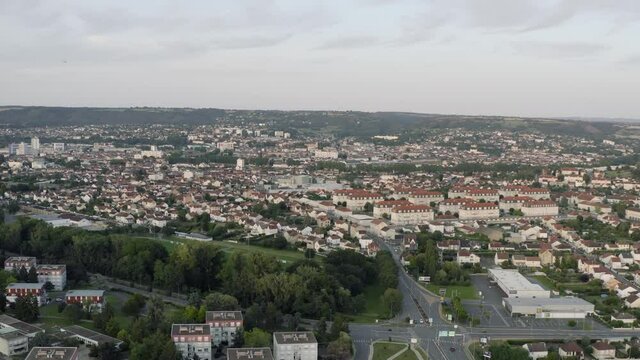 Drone Aerial shot of Montluçon in central France. Montlucon is the largest commune in the Allier department and belongs to the Auvergne-Rhône-Alpes region. A panorama of the french city at sunset.