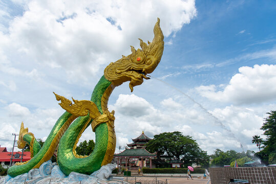 Low angle of Naga statue at the mekong river, Wat Lamduan temple, Nong Khai province Thailand. Most famous landmark.