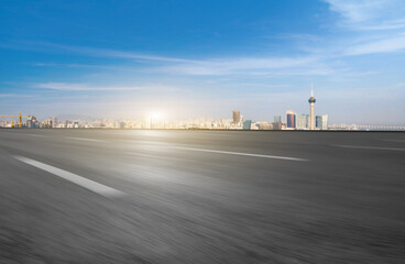 Road and modern city buildings background