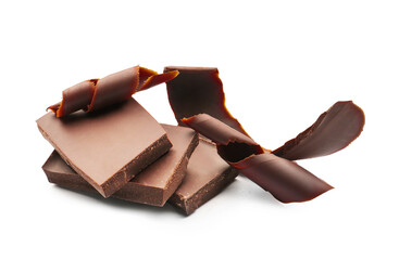 Delicious chocolate curls and pieces on white background