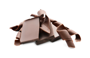Delicious chocolate curls and pieces on white background