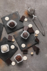 Sweet chocolate candies on grunge background