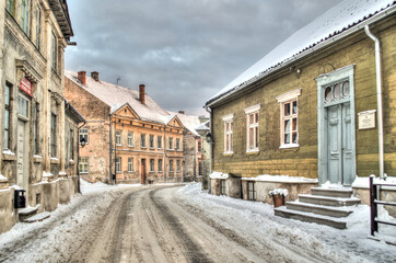 Fototapeta na wymiar Kuldiga old town with historical houses in winter day, Latvia.