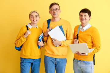 Group of students on color background