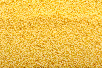 Tasty couscous as background, closeup