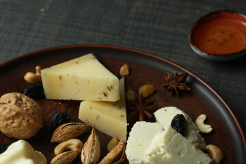 three types of cheese on a plate. High quality photo