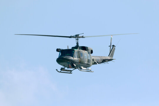 Luqa, Malta January 29, 2015: Italian Air Force Agusta AB-212ICO (REG: 86113), stationed in Malta on agreement with the Italian Govt. overflies the airfield.