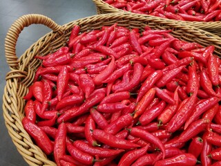 basket of peppers in a market