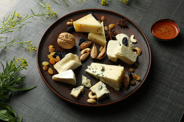 three types of cheese on a plate. High quality photo