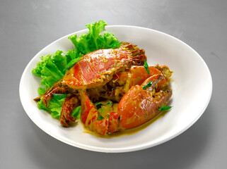wok stir fried big meat crab seafood with chilli sauce, golden salted egg yolk asian halal menu