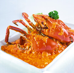wok stir fried big meat crab seafood with chilli sauce, golden salted egg yolk asian halal menu