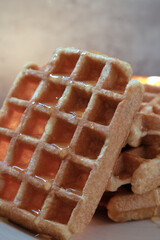 Close-up of waffle with honey