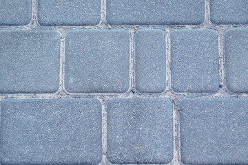 Old natural stone wall on background. Brick wall with ancient masonry. Full frame of rich and varied texture close up.