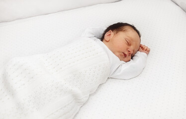 Newborn Baby Peacefully Sleeping at home