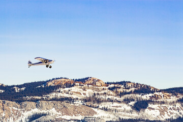Bush Plane rock hills taiga landscape Yukon Canada