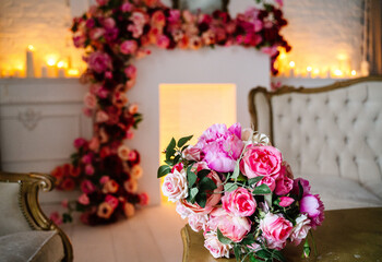 Fireplace decorated with flowers seding interior