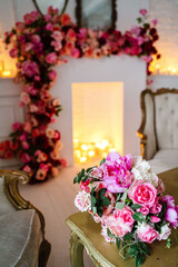 Fireplace decorated with flowers seding interior