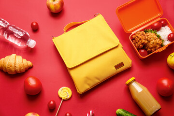 Lunch box bag and food on color background