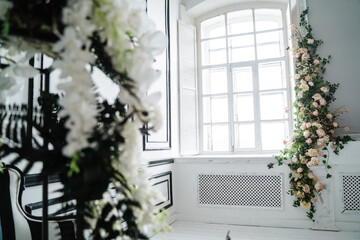 Large bright window in the design of flowers