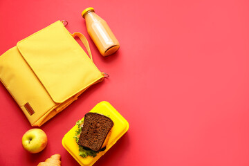 Lunch box bag and food on color background