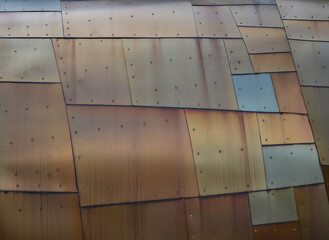 Copper metal plates with rivets and water stains. Muliti color metal background abstract metal...