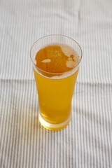 Cold Beer in a Glass, side view.