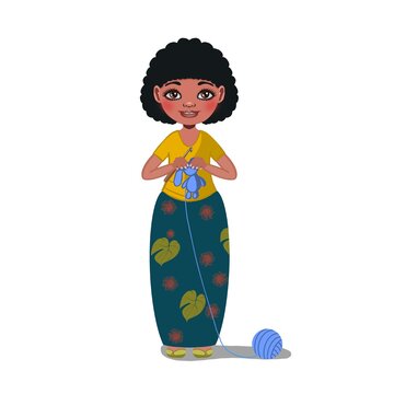 Portrait of a small dark-skinned needlewoman girl standing and crocheting a toy on a white background, lessons and games for children, summer camp vacations, hobbies and interests. Book, advertisement