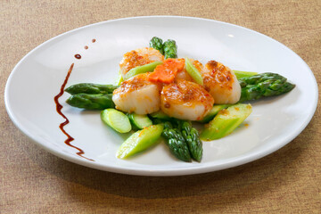 stir fried seafood with scallop, prawn, braised sea cucumber and vegetable in chef special sauce asian halal healthy menu