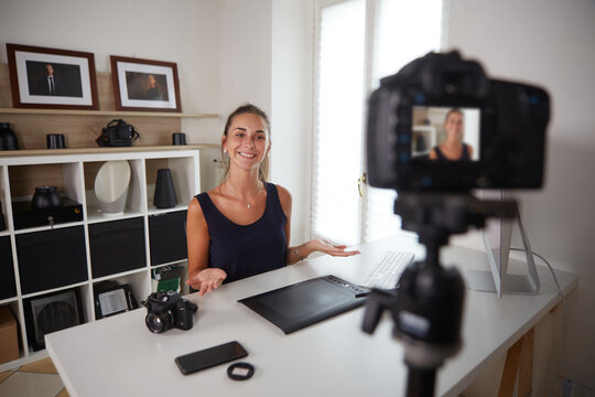 young youtuber record photography vlog