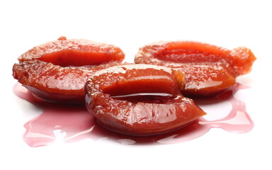 Plum compote, fruit kompot isolated on white background
