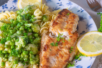 Fish with pasta and vegetables