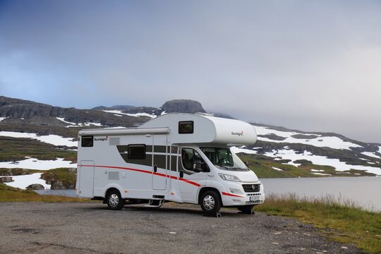 HAUKELIFJELL, NORWAY - JULY 30, 2020: Camper van vacation in Haukelifjell mountains, Norway. Norway had 8.8 million foreign visitors in 2015.
