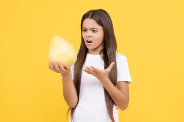 what is that. natural organic ripe fresh pummelo. healthy life. fruit diet. teenage girl with pomelo