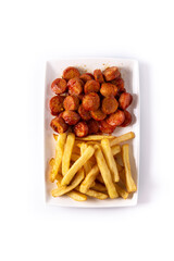 Traditional German currywurst isolated on white background. Suasages with ketchup and curry