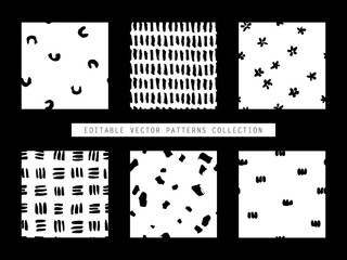 Collection of hand drawn vector seamless patterns in black and white. Realistic painted brush strokes ornament tiles.