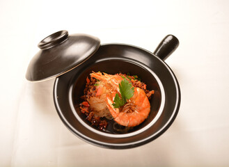stir fried spicy chilli sauce big tiger prawn with grass vermicelli noodle mee in black clay hot pot asian halal menu