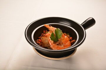 stir fried spicy chilli sauce big tiger prawn with grass vermicelli noodle mee in black clay hot pot asian halal menu