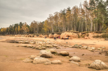 Veczemju klintis (Veczemju cliffs) on Baltic sea near Tuja, Latvia. Beautiful sea shore with limestone and sand caves. - obrazy, fototapety, plakaty
