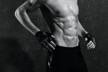 Obraz na płótnie Canvas sports man in gloves workout motivation exercise strength