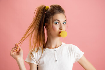 Portrait of adorable pretty young girl in retro 90s fashion style, outfits posing isolated over...