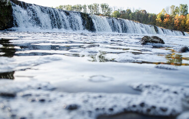 Venta waterfall in autumn day. The widest waterfall in Europe, Kuldiga, Latvia.