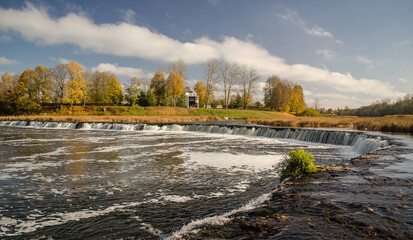 Venta waterfall in autumn day. The widest waterfall in Europe, Kuldiga, Latvia.
