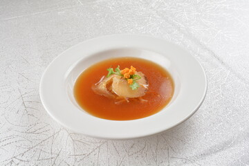 double boiled luxury seafood shark's fin crab meat and mushroom thick soup in hot clay pot asian premium halal menu