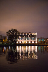 park overlooking the lake and houses at night