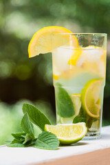 Lemonade with lemon, mint, lime, ice. Close-up. 